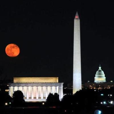 A full red moon over the Nation's monuments