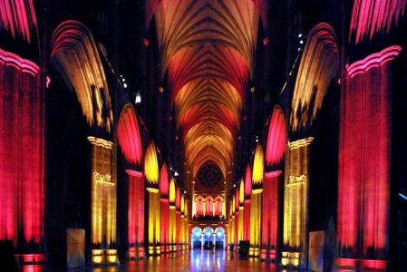 Red and yellow lights on the arches at the National Cathedral