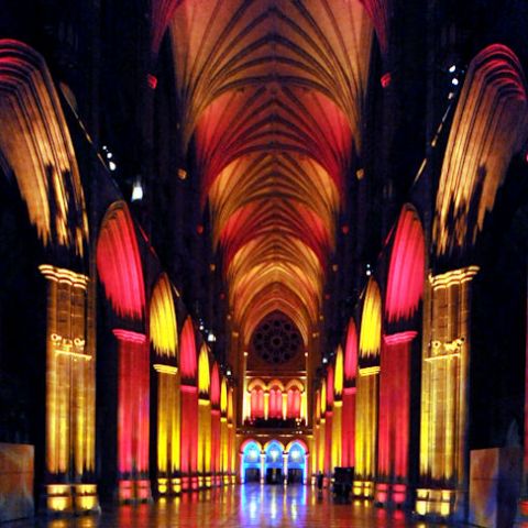 Red and yellow lights on the arches at the National Cathedral