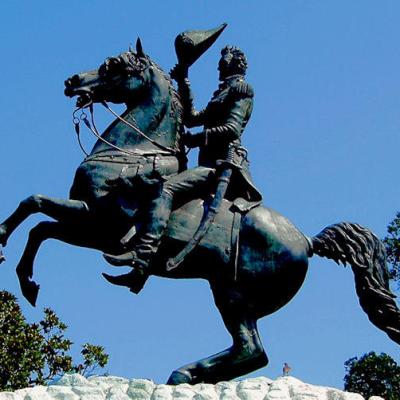 A statue of a man on a horse