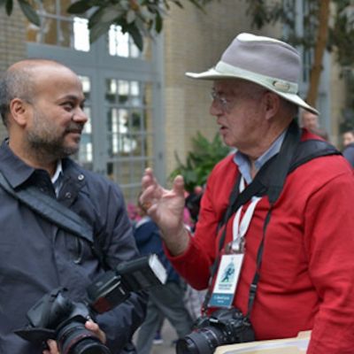 Mr. Luria speaking with a photographer