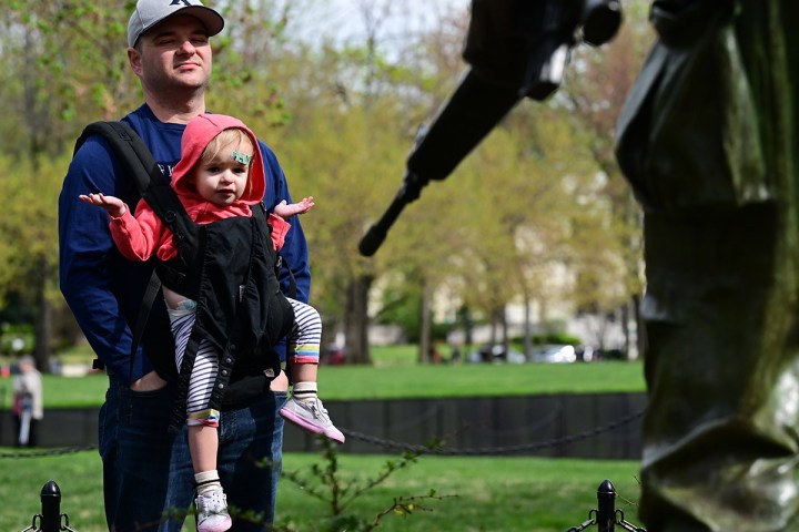 A father & daughter at the Three Servicemen Statue Washington, DC