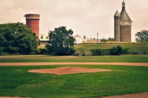 a castle on top of a grass covered field
